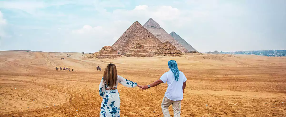 American couple visit the pyramids of Giza with iEgypt tours and travels
